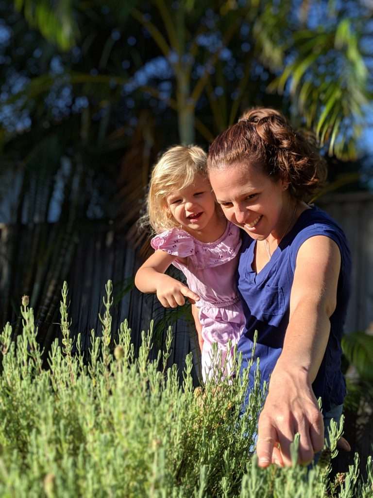 Mother and daughter in the garden